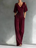 Mono Elegante Mujer con Escote Cruzado y Pernera Ancha | Mia