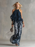 Elegante conjunto de mujer de dos piezas de invitada de boda con top halter de volantes y pantalón ancho